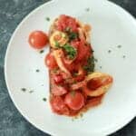 squid, chorizo and tomato on toast