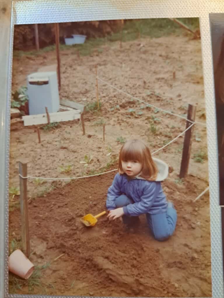 Chloe at 4 years old digging in her vegetable patch