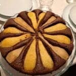 chocolate pear cake on a cake stand